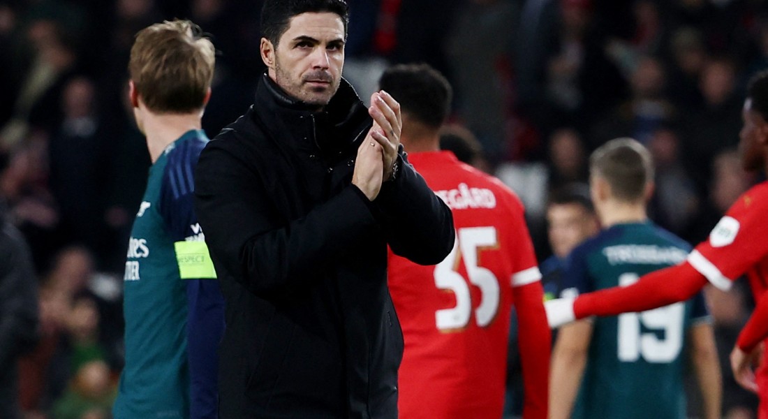 Soccer Football - Champions League - Group B - PSV Eindhoven v Arsenal - Philips Stadion, Eindhoven, Netherlands - December 12, 2023 Arsenal manager Mikel Arteta applauds fans after the match REUTERS/Yves Herman