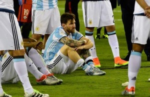 _90123441_messi_sitting_afp