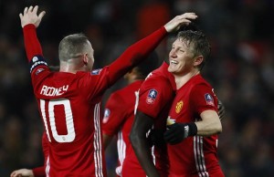 Manchester United's Bastian Schweinsteiger celebrates scoring their fourth goal with Wayne Rooney