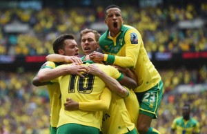 LONDON, ENGLAND - MAY 25:  Cameron Jerome of Norwich City (10) is congratulated by Martin Olsson (23) and team mates as he scores their first goal during the Sky Bet Championship Playoff Final between Middlesbrough and Norwich City at Wembley Stadium on May 25, 2015 in London, England.  (Photo by Tom Dulat/Getty Images)