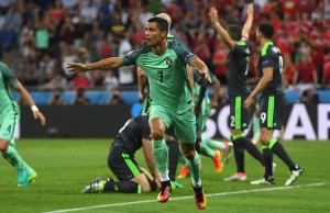 LYON, FRANCE - JULY 06: Cristiano Ronaldo of Portugal celebrates scoring the opening goal during the UEFA EURO 2016 semi final match between Portugal and Wales at Stade des Lumieres on July 6, 2016 in Lyon, France. (Photo by Stu Forster/Getty Images)