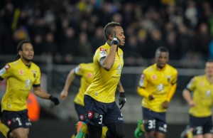 Sochaux French forward Jordan Ayew (C) celebrates after scoring a goal  during the French L1 football match between FC Sochaux (FCSM) and Girondins de Bordeaux (FCGB) on March 1, 2014, at the Auguste Bonal stadium in Montbeliard, eastern France. AFP PHOTO / SEBASTIEN BOZON        (Photo credit should read SEBASTIEN BOZON/AFP/Getty Images)