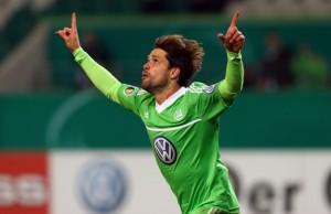 WOLFSBURG, GERMANY - OCTOBER 31: Diego of Wolfsburg celebrates after vhe scores his team's 1st goal during the DFB Cup second round match between VfL Wolfsburg and FSV Frankfurt at Volkswagen Arena on October 31, 2012 in Wolfsburg, Germany.  (Photo by Martin Rose/Bongarts/Getty Images)