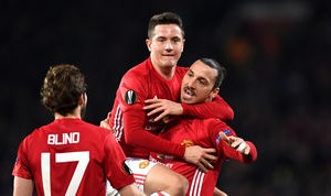 MANCHESTER, ENGLAND - FEBRUARY 16: Zlatan Ibrahimovic of Manchester United celebrates scoring his sides first goal with Ander Herrera during the UEFA Europa League Round of 32 first leg match between Manchester United and AS Saint-Etienne at Old Trafford on February 16, 2017 in Manchester, United Kingdom. (Photo by Shaun Botterill/Getty Images)
