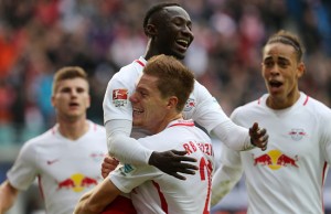 LEIPZIG, GERMANY - OCTOBER 23: Naby Deco Keita of Leipzig jubilates with team mates after scoring the first goal during the Bundesliga match between RB Leipzig and SV Werder Bremen at Red Bull Arena on October 23, 2016 in Leipzig, Germany. (Photo by Matthias Kern/Bongarts/Getty Images)
