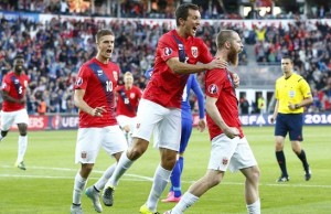 Norway's Jo Inge Berget (R) celebrates scoring 1 - 0 with his teammates Markus Henriksen (L) and Even Hovland during the Euro 2016 Group H qualifying football match between Norway and Croatia at in Oslo, on September 6, 2015. AFP PHOTO / NTB scanpix / LARSEN, HAAKON MOSVOLD NORWAY OUT (Photo credit should read Larsen, Haakon Mosvold/AFP/Getty Images)