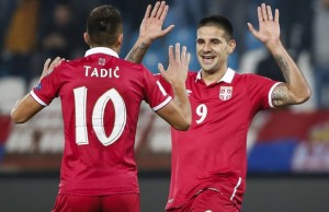 BELGRADE, SERBIA - OCTOBER 09: Aleksandar Mitrovic (R) celebrate scoring a goal with the Dusan Tadic (L) of Serbia during the FIFA 2018 World Cup Qualifier between Serbia and Austria at stadium Rajko Mitic on October 9, 2016 in Belgrade, . (Photo by Srdjan Stevanovic/Getty Images)