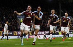 Britain Football Soccer - Burnley v Watford - Premier League - Turf Moor - 26/9/16 Burnley's Michael Keane celebrates scoring their second goal with George Boyd and teammates Action Images via Reuters / Jason Cairnduff Livepic EDITORIAL USE ONLY. No use with unauthorized audio, video, data, fixture lists, club/league logos or "live" services. Online in-match use limited to 45 images, no video emulation. No use in betting, games or single club/league/player publications. Please contact your account representative for further details.