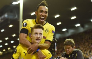 LIVERPOOL, ENGLAND - APRIL 14:  Marco Reus of Borussia Dortmund celebrates scoring his team's third goal with Pierre-Emerick Aubameyang during the UEFA Europa League quarter final, second leg match between Liverpool and Borussia Dortmund at Anfield on April 14, 2016 in Liverpool, United Kingdom.  (Photo by Shaun Botterill/Getty Images)