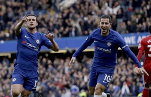 Chelsea's Pedro celebrates scoring his side's first goal next to Eden Hazard, right, during the English Premier League soccer match between Chelsea and Watford at Stamford Bridge stadium in London, Saturday, Oct. 21, 2017. (AP Photo/Matt Dunham)