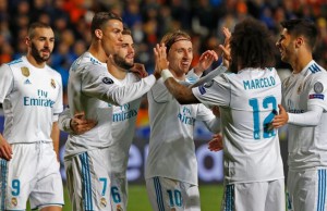 Real Madrid's Portuguese forward Cristiano Ronaldo (2nd-R) celebrates with teammates his first goal, and his team's fifth, during the UEFA Champions League Group H match between Apoel FC and Real Madrid on November 21, 2017, in the Cypriot capital Nicosia's GSP Stadium.  / AFP PHOTO / Jack GUEZ        (Photo credit should read JACK GUEZ/AFP/Getty Images)